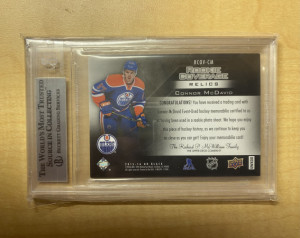 Connor McDavid 2015-16 Upper Deck Black Rookie Coverage Jersey BGS 8.5 back