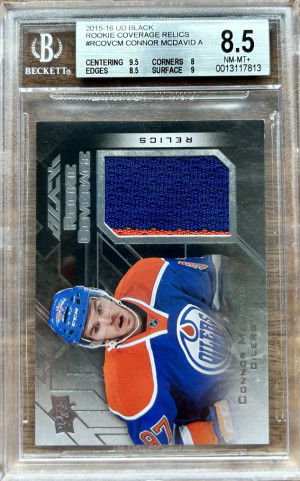 Connor McDavid 2015-16 Upper Deck Black Rookie Coverage Jersey BGS 8.5 front
