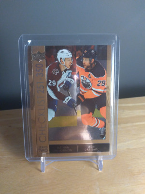 Leon Draisaitl/Nathan MacKinnon 2021-22 Silver Foil Checklist front